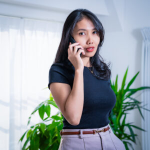 Studio portrait of a businesswoman making a phone call