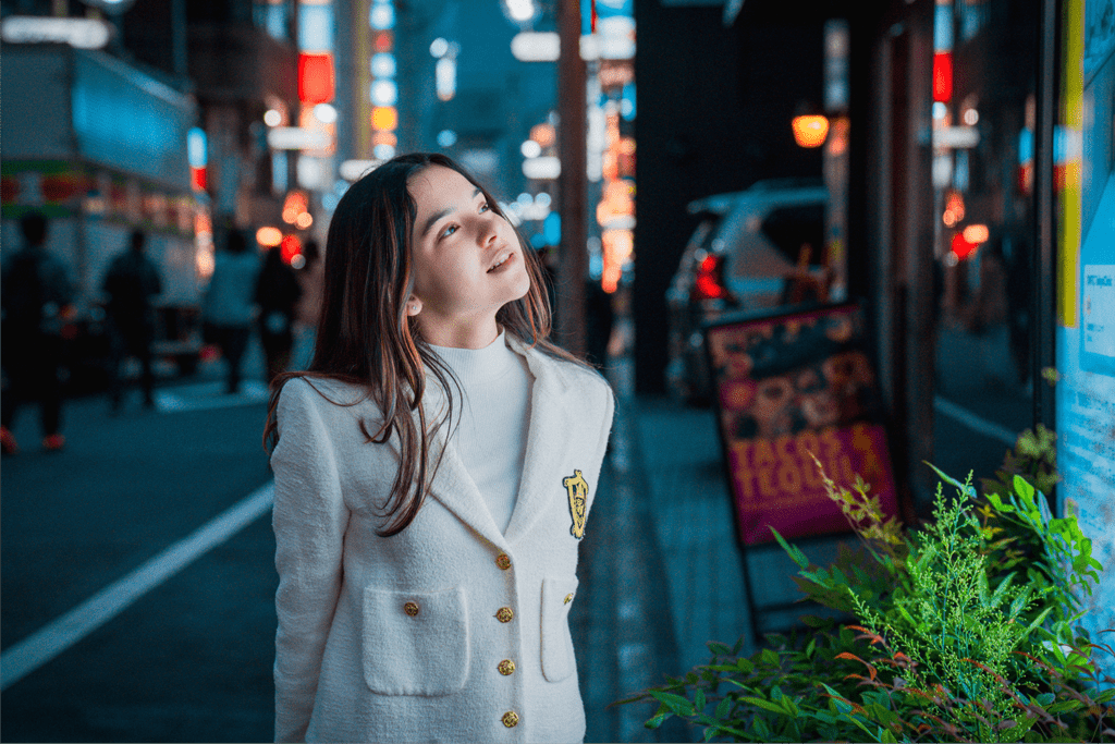 Neon candid portrait of a girl in Shibuya Center Gai