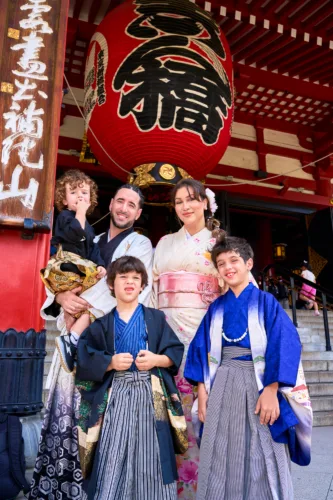 French Freestyle Footballer Séan Garnier & Influencer Souhila Garnier Garnier Family dressed in traditional Japanese kimono posing in front of Sensoji temple with a large red lantern.