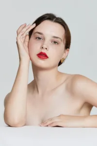 Beauty portrait of professional model Liza with red lipstick at Tokyo photo studio.