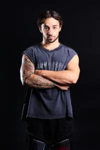 Professional portrait of a tattooed man for a model portfolio, taken in a Tokyo photo studio.