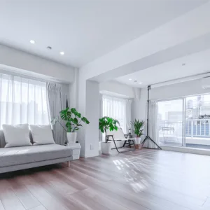 Spacious Tokyo photo studio rental with natural light, minimalist decor, and balcony access for professional shoots.