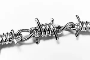 Close-up of silver jewelry clasp, fashion accessory photography by JG Brasseur in Tokyo.